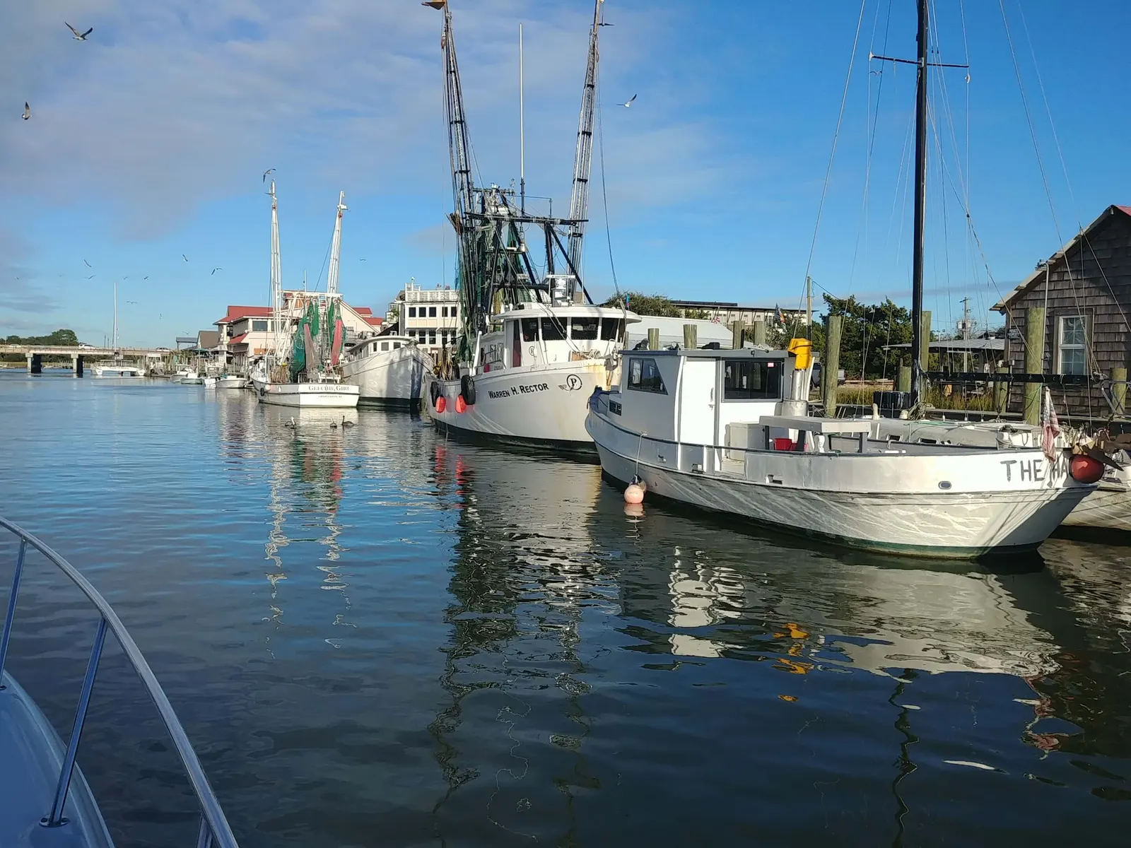Shrimp boats and charter boats docked along Shem Creek